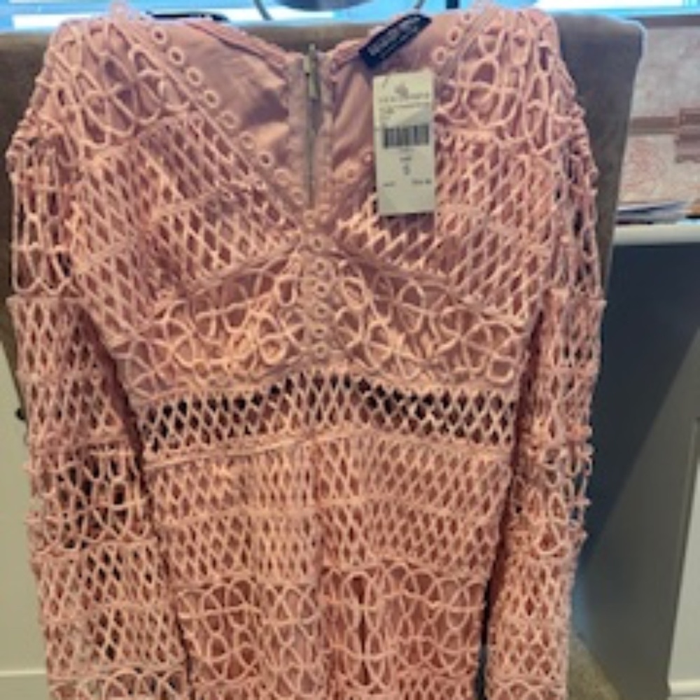 Fashion Nova Romper. Size small. Very cute. Doesn't fit me so I'm reselling. NWT